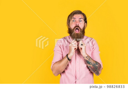 scared and surprised brutal man. Facial care. Mature hipster with beard. brutal caucasian hipster with moustache. Male barber care. Bearded man. Hair and beard care. wow it is incredible 98826833