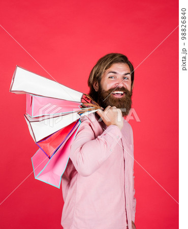 let go shop. buy in mall. happy bearded man holding gift package. happy birthday or anniversary. holiday celebration. surprise for him. shopping and sale. mature brutal hipster with present let go shop. buy in mall. happy bearded man holding gift package. happy birthday or anniversary. holiday celebration. surprise for him. shopping and sale. mature brutal hipster with present 98826840