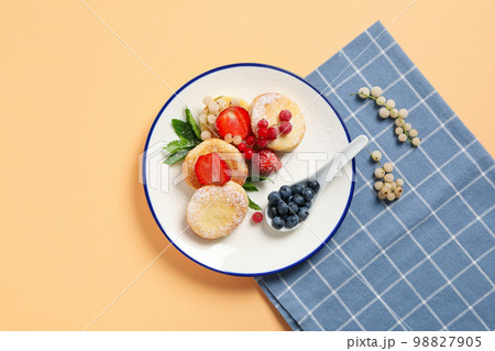 Concept of tasty sweet food, cheese pancakes, top view Concept of tasty sweet food, cheese pancakes, top view 98827905