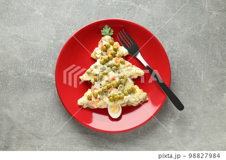 Concept of New year food, Olivier salad, top view Concept of New year food, Olivier salad, top view 98827984