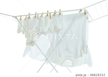 Drying rack with clothes, isolated on white background Drying rack with clothes, isolated on white background 98828332