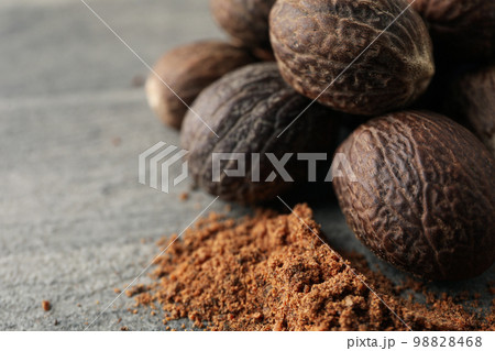Concept of spices and condiments, nutmegs, space for text 98828468