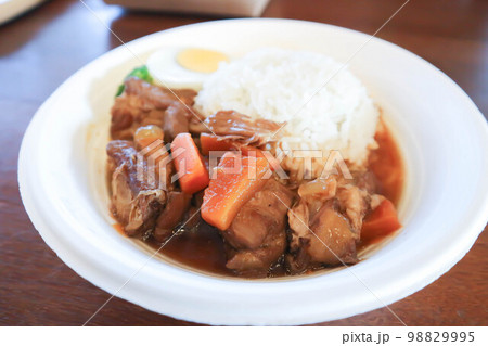 stewed pork ,pork with rice and sauce or rice...の写真素材 [98829995] - PIXTA