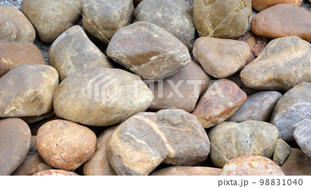 Background pattern of river rocks with rounded corners and some smooth surface. 98831040