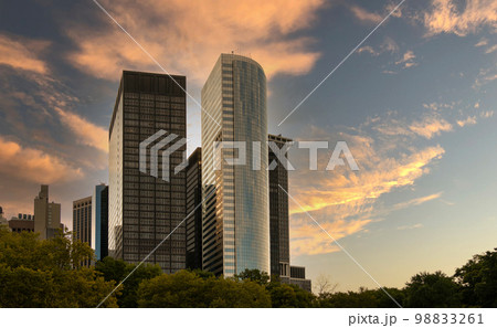 Skyscrapers of lower Manhattan at sunrise or sunset Skyscrapers of lower Manhattan at sunrise or sunset 98833261