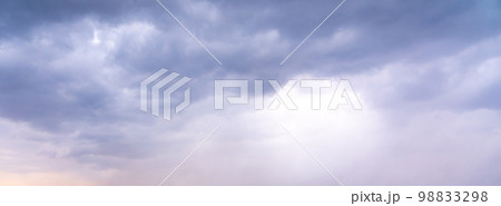 Dramatic sky background. Stormy clouds in dark sky. Moody cloudscape Dramatic sky background. Stormy clouds in dark sky. Moody cloudscape 98833298