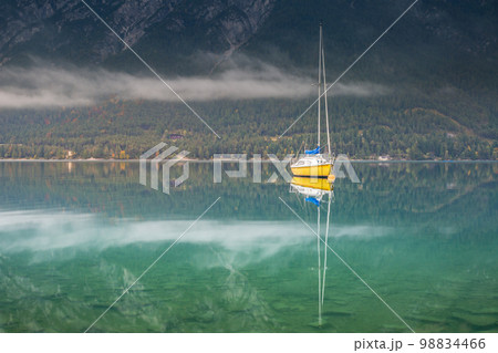 Sailboats on Achensee lake near Innsbruck at peaceful dawn, Tyrol alps, Austria 98834466