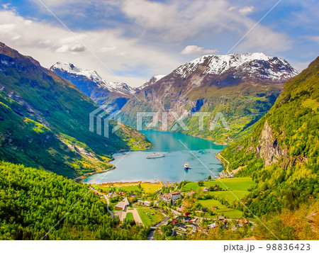Above idyllic Geiranger fjord dramatic landscape, Norway 98836423