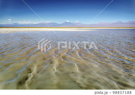 Licancabur with reflection lake and volcanic landscape at Sunset, Atacama, Chile Licancabur with reflection lake and volcanic landscape at Sunset, Atacama, Chile 98837188