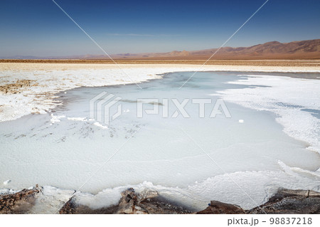 Salt lake, volcanic landscape at sunrise, Atacama, Chile border with Bolivia 98837218