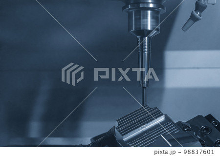 The 5-axis CNC milling machine cutting the automotive parts with ball end mill tool. 98837601