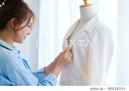 Young woman and fashion designer is create the new collections of cloth. 98838241