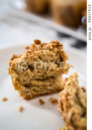 Freshly baked banana oatmeal muffins with oatmeal sugar topping. Freshly baked banana oatmeal muffins with oatmeal sugar topping. 98847818