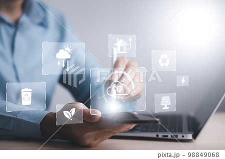 man hold Smartphone and global network connection with virtual modern reduce CO2 emission concept with icons, global warming emissions carbon footprint climate change to limit global warming, energy man hold Smartphone and global network connection with virtual modern reduce CO2 emission concept with icons, global warming emissions carbon footprint climate change to limit global warming, energy 98849068
