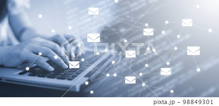 Businesswoman holding smartphone with communication icons, letter icon, email icons, and newsletter email and protect your personal information or spam mail, Customer service call center contact. Businesswoman holding smartphone with communication icons, letter icon, email icons, and newsletter email and protect your personal information or spam mail, Customer service call center contact. 98849301