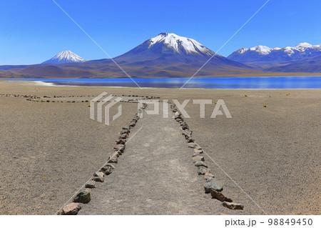 Valley of the Moon and lake, Atacama Desert dramatic landscape, Chile 98849450
