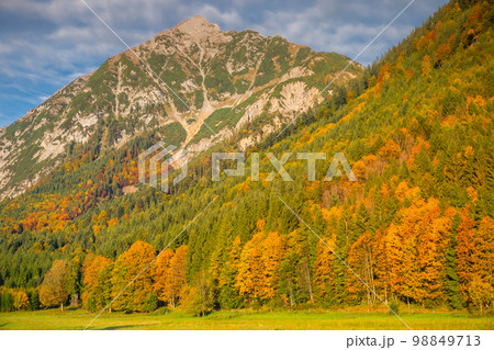 Karwendel alps at golden autumn sunrise, tyrol and bavarian alps border, Austria Karwendel alps at golden autumn sunrise, tyrol and bavarian alps border, Austria 98849713