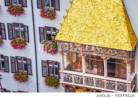Close-up of the ornate golden roof in Innsbruck at springtime, Austria Close-up of the ornate golden roof in Innsbruck at springtime, Austria 98849820
