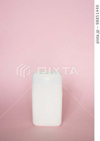 Blank square white bottle for shower gel, shampoo, lotion, cream, soap, gel on pink background. Beauty product and body care cosmetics. Blank square white bottle for shower gel, shampoo, lotion, cream, soap, gel on pink background. Beauty product and body care cosmetics. 98851440
