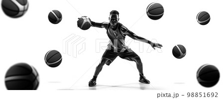 Collage. Black and white. African man, professional basketball player dribbling ball over white background with many balls Collage. Black and white. African man, professional basketball player dribbling ball over white background with many balls 98851692