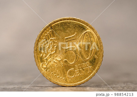 Fifty Euro cent coin on the grey stone background 98854213