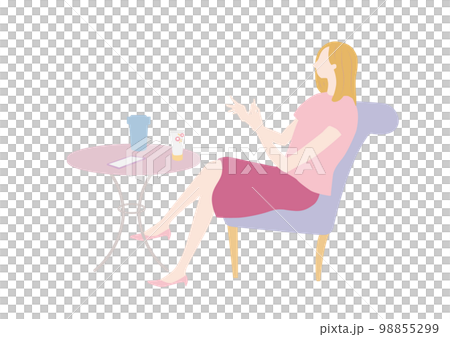 A woman relaxing at a cafe 98855299