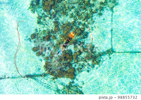 Aerial view of Sunrise beach with long tail boats in Koh Lipe, Satun, Thailand 98855732