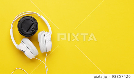 Headphones on yellow 98857420