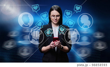Young woman using smartphone to communicate in social networks 98858593