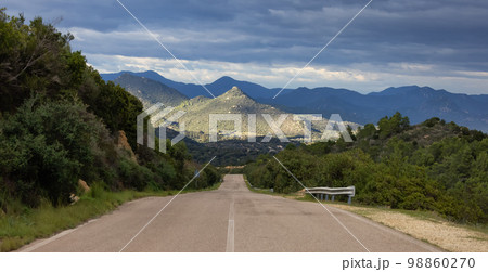 Scenic Road in the mountains by the Sea Coast. Sardinia, Italy. Scenic Road in the mountains by the Sea Coast. Sardinia, Italy. 98860270
