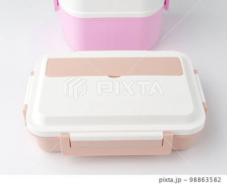 Close up of food containers isolated on white background. Close up of food containers isolated on white background. 98863582