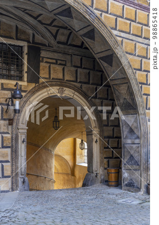 Public passage through castle in Cesky Krumlov 98865418