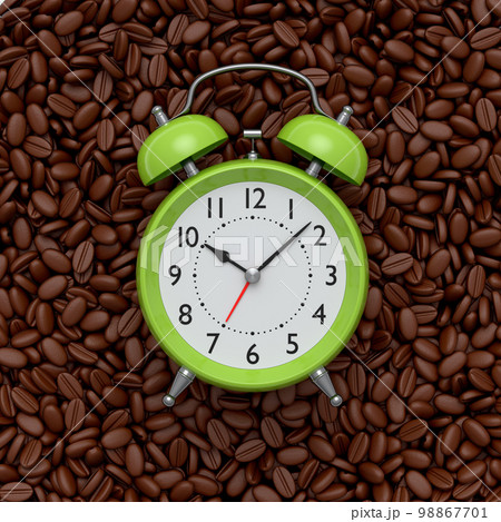Vintage alarm clock with roasted coffee beans spread out as background. 98867701