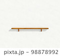 白い壁と木製の棚 98878992
