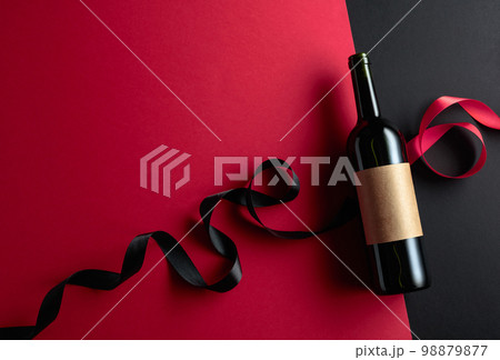 Bottle of red wine with empty label. Bottle of red wine with empty label. 98879877