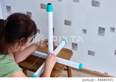 Assembling floor fan at home by yourself, after purchase in flat pack. Assembling floor fan at home by yourself, after purchase in flat pack. 98880405