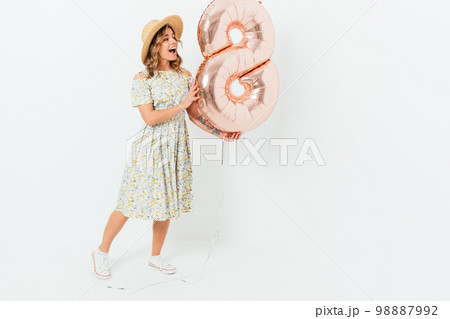 Full length portrait of happy pretty girl wearing dress Full length portrait of happy pretty girl wearing dress 98887992