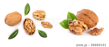 Walnuts with leaf isolated on white background. Top view. Flat lay Walnuts with leaf isolated on white background. Top view. Flat lay 98889191