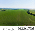 Beautiful wheat field green aerial view 98891736
