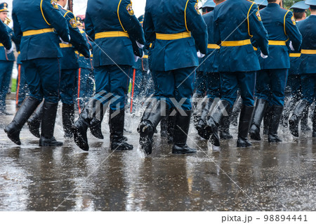 feet of the Russian military in boots marching on march 98894441