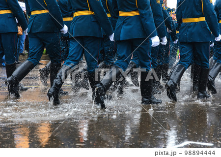 feet of the Russian military in boots marching on march 98894444