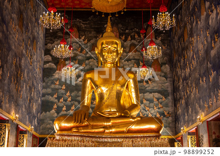 Close up of golden Buddha sculpture in temple. Golden Buddha Statue. Golden Buddha Sculpture at Wat Devaraj Kunchon Temple in Bangkok 98899252