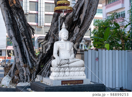 Close up of Buddha sculpture in temple. White Buddha Statue. Buddha Sculpture at Wat Temple in Bangkok 98899253