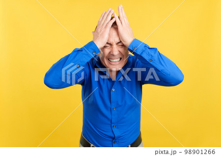 Desperate mature man gesturing that he make a mistake 98901266