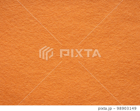 Orange felt texture. Saturated background for Christmas desktop, holiday New Year, xmas seasonal decoration, valentin day, text, lettering, patchwork or, party greeting and wedding card element. Orange felt texture. Saturated background for Christmas desktop, holiday New Year, xmas seasonal decoration, valentin day, text, lettering, patchwork or, party greeting and wedding card element. 98903149