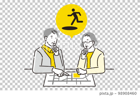 A senior couple who checks the evacuation route with a person hazard map 98908460