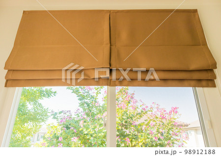 Roman blind curtain decoration in living room interior Roman blind curtain decoration in living room interior 98912188