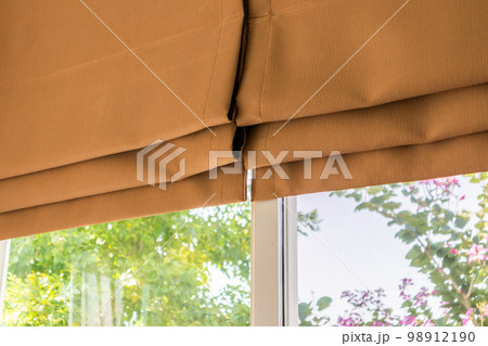 Roman blind curtain decoration in living room interior 98912190