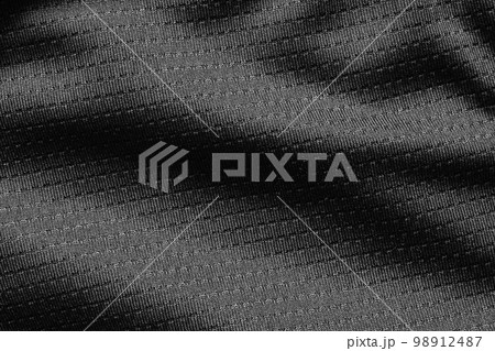 Black sport cloth fabric football shirt jersey texture close up Black sport cloth fabric football shirt jersey texture close up 98912487
