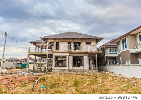 New house under construction at building site 98912748